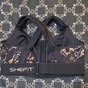 SHEFIT Black and Gold Sports Bra